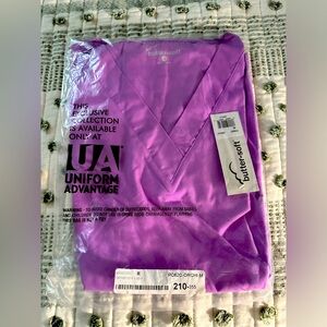 Lilac Butter Soft Scrub top, comfortable & durable material. Brand new w/ tags.